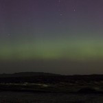 An aurora, an eclipse and an equinox